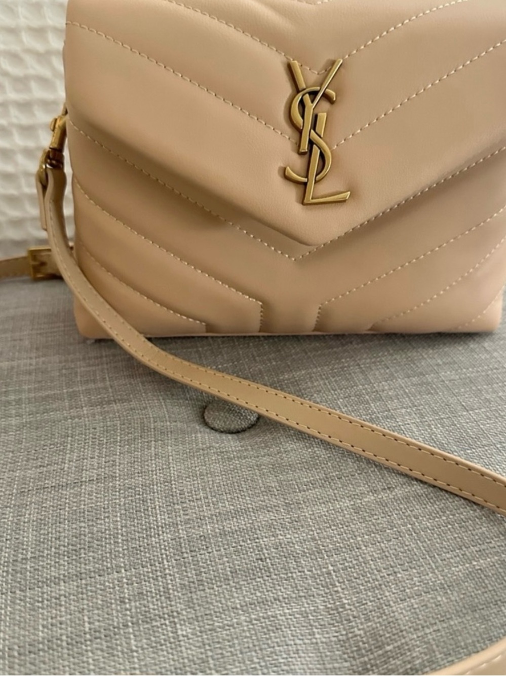 Tan quilted small crossbody bag